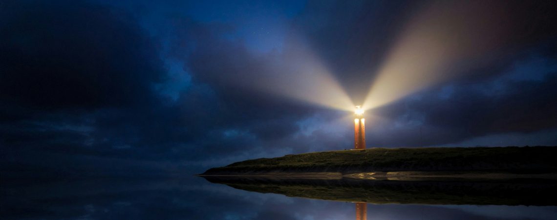 a lighthouse at night